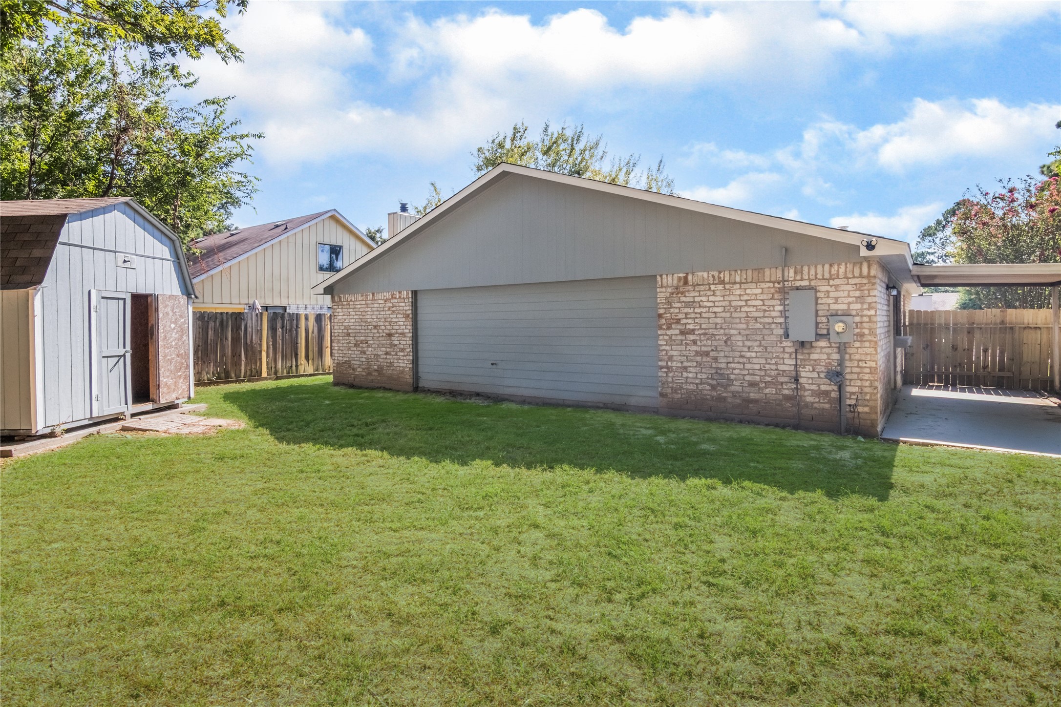 22914 Summer Pine Lane Spring, TX 77373 - Photo 19 of 19 a view of a backyard with potted plants