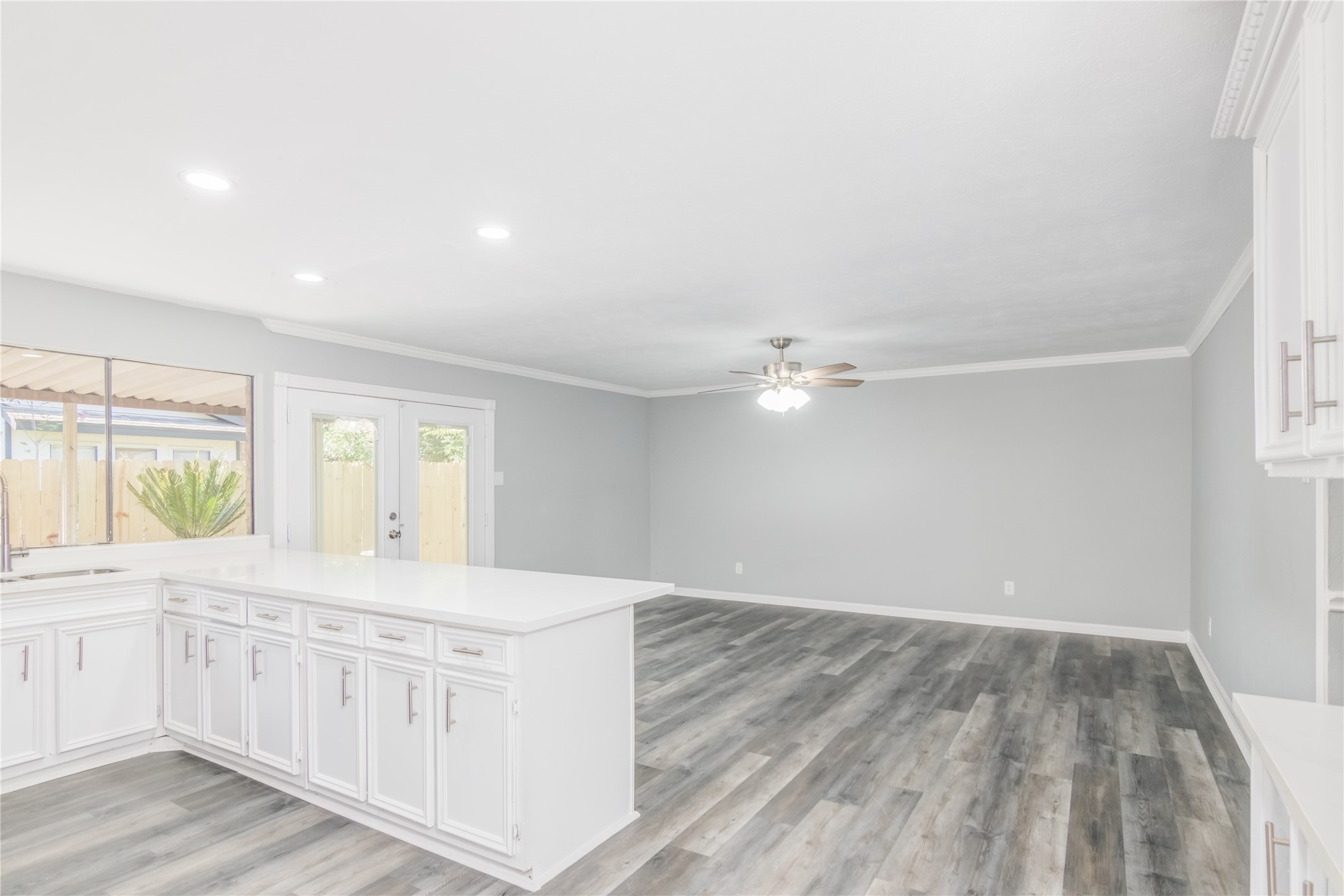 22914 Summer Pine Lane Spring, TX 77373 - Photo 7 of 19 a view of a kitchen cabinets a sink and wooden floor