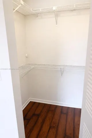 a view of a room with racks on the wall