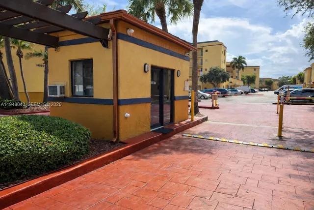 a view of a backyard with sitting area