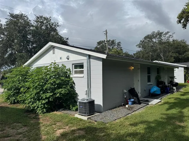 a front view of a house with a ocean view