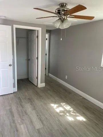 a bathroom with a sink toilet and mirror