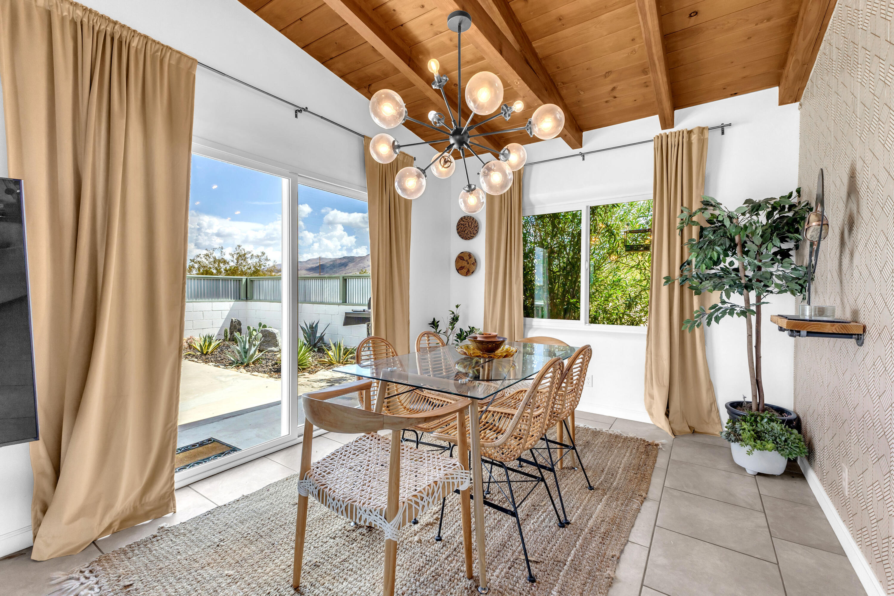 75047 Baseline Road Twentynine Palms, CA 92277 - Photo 18 of 47 a view of an outdoor dining space with a table and chairs