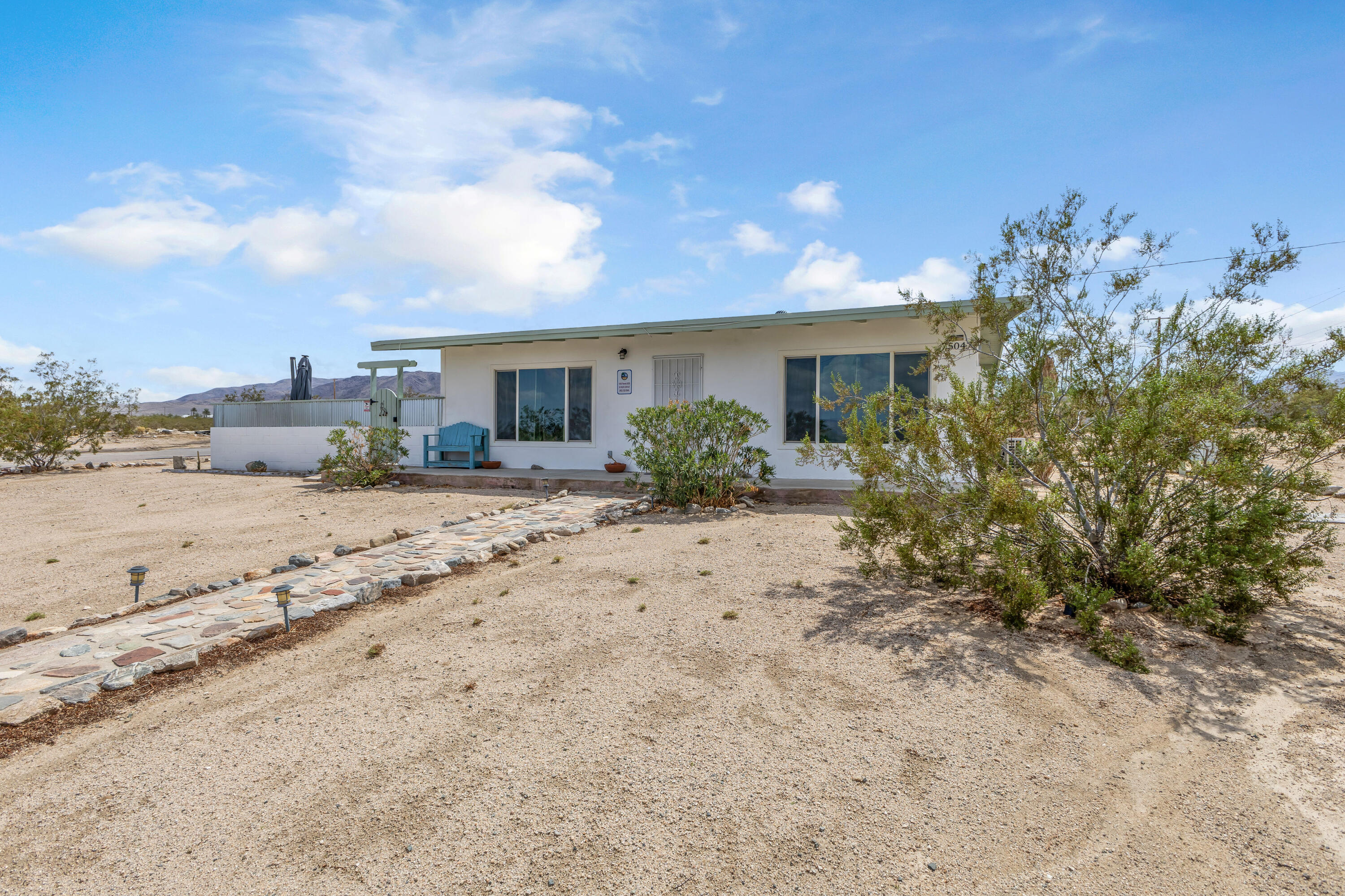 75047 Baseline Road Twentynine Palms, CA 92277 - Photo 2 of 47 a view of a house with a patio