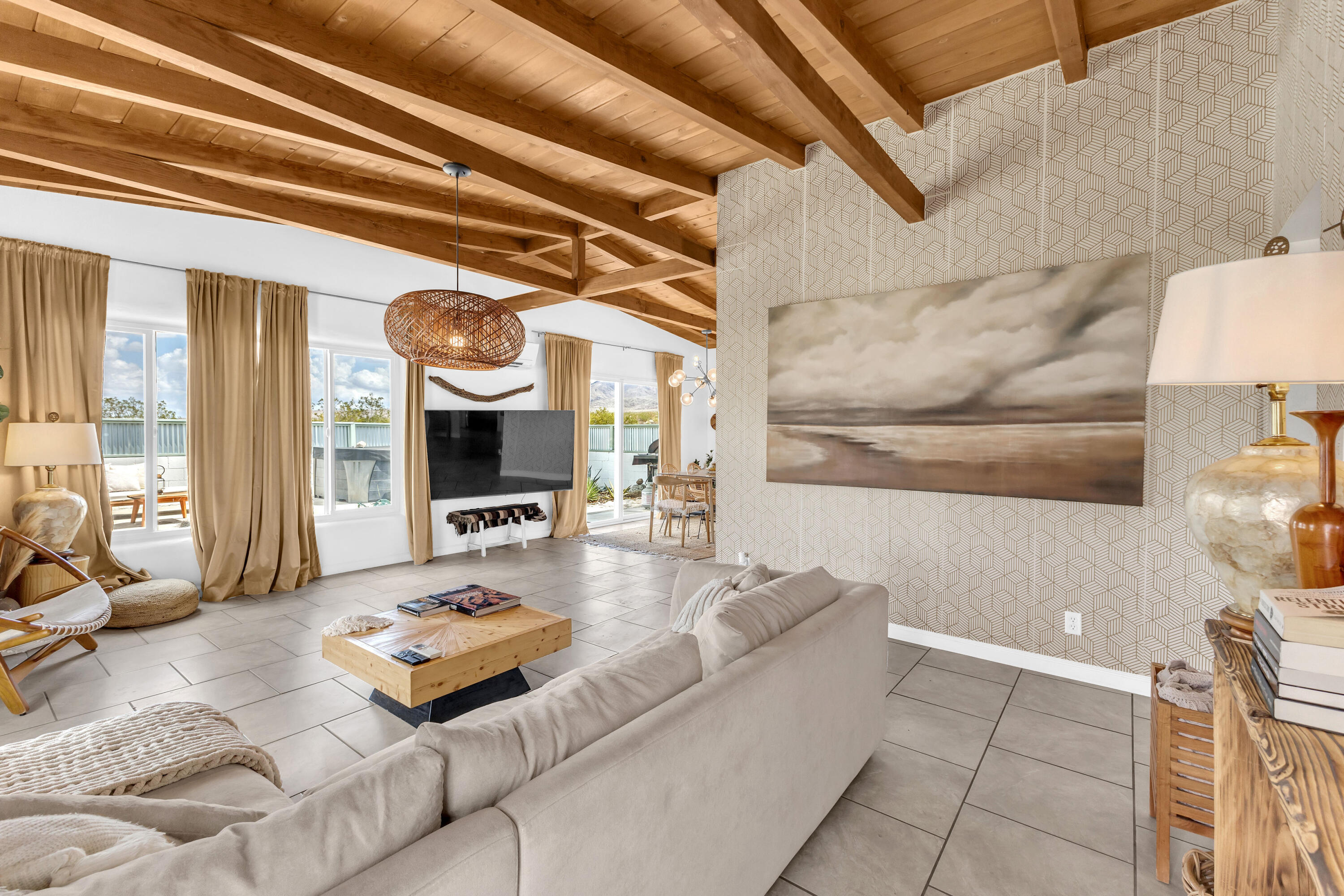 75047 Baseline Road Twentynine Palms, CA 92277 - Photo 28 of 47 a living room with furniture and a fireplace