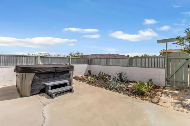a view of a terrace with sitting area