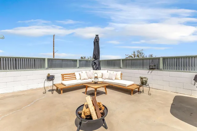 a view of a terrace with chairs