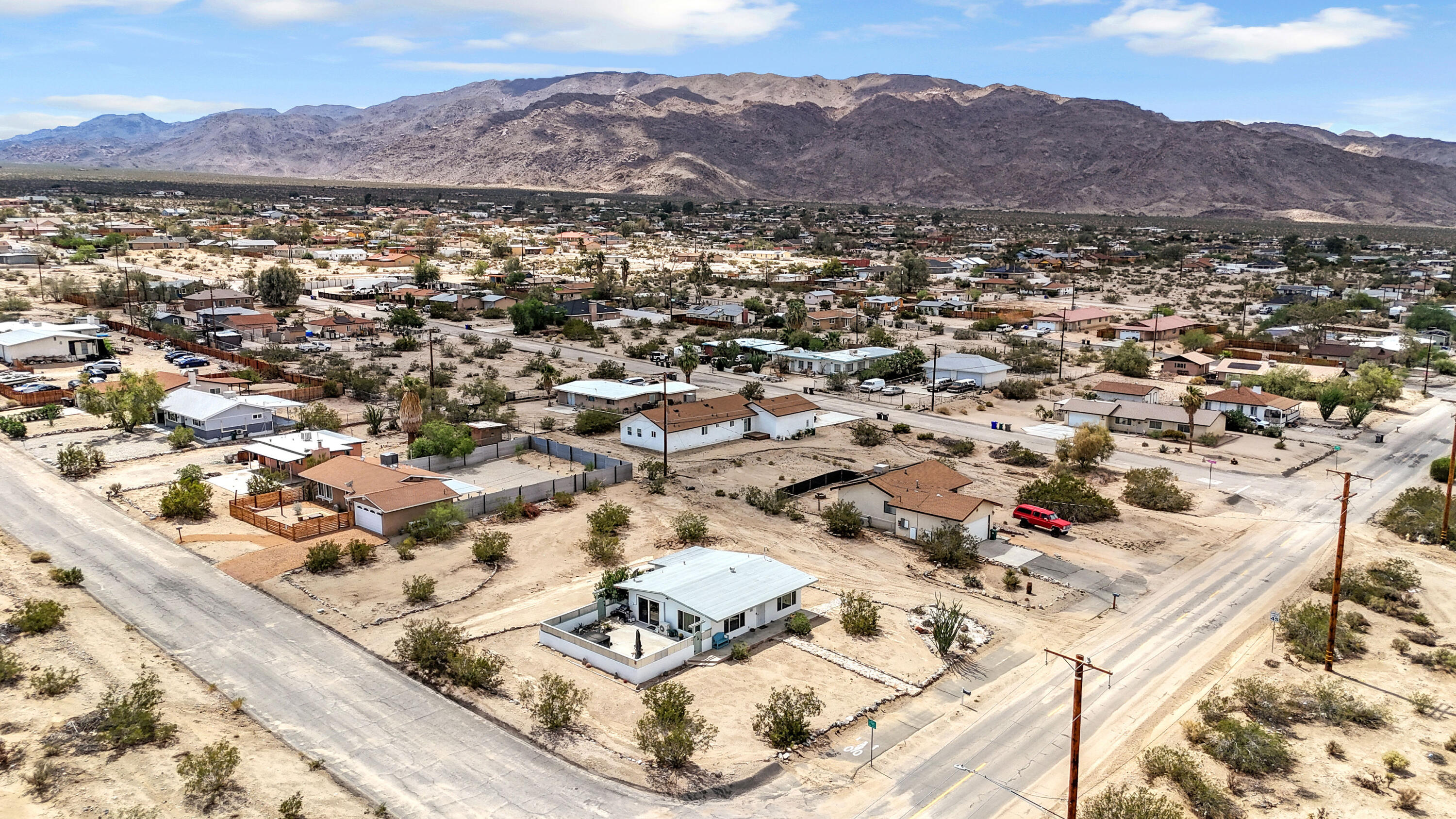 75047 Baseline Road Twentynine Palms, CA 92277 - Photo 39 of 47 an aerial view of residential house and sandy dunes