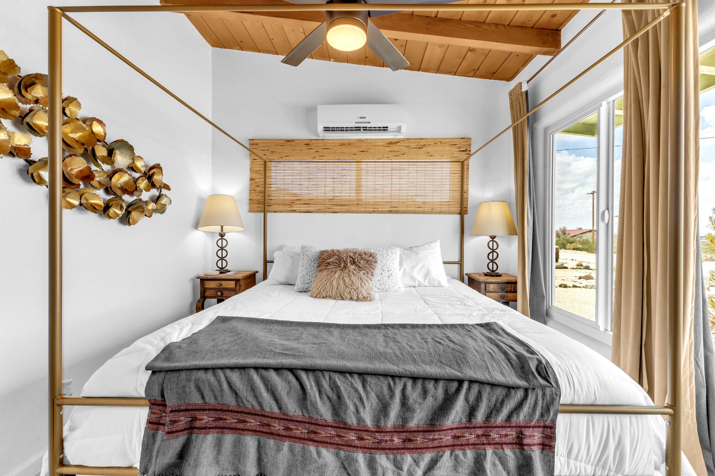 75047 Baseline Road Twentynine Palms, CA 92277 - Photo 8 of 47 a bedroom with a bed and window