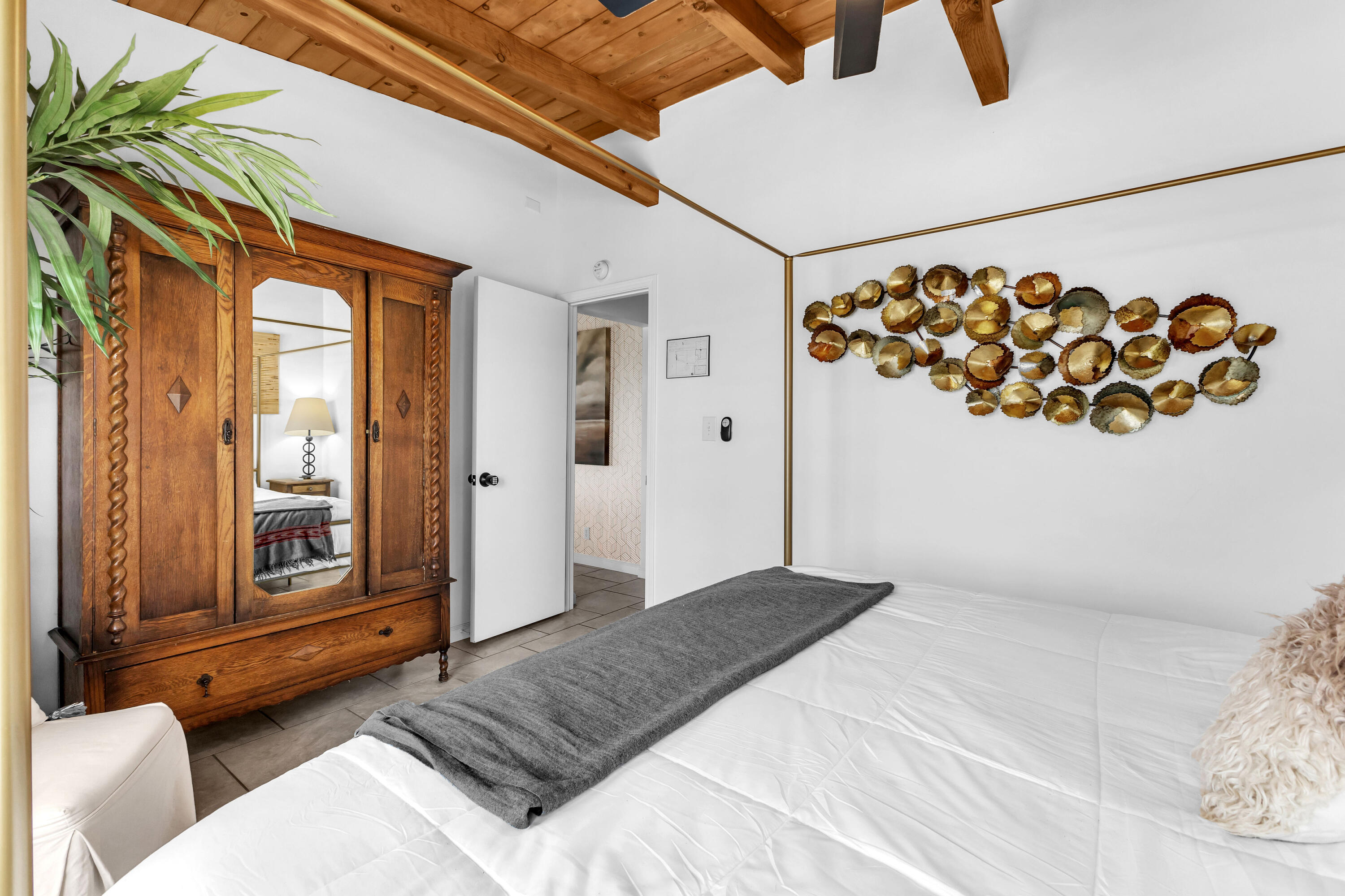 75047 Baseline Road Twentynine Palms, CA 92277 - Photo 9 of 47 a bedroom with a large bed and a window