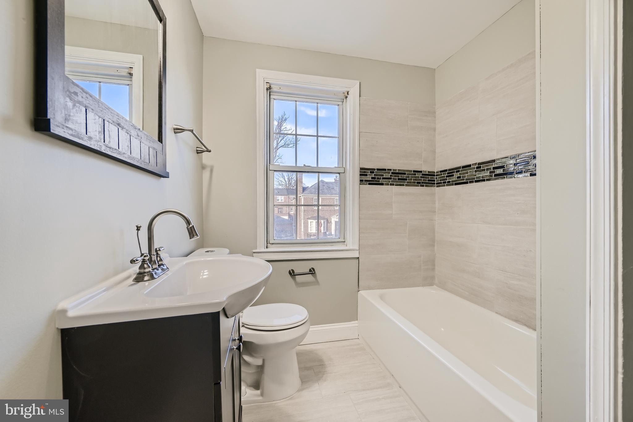 1513 Shadyside Road Baltimore, MD 21218 - Photo 16 of 37 Convenient Full Bath