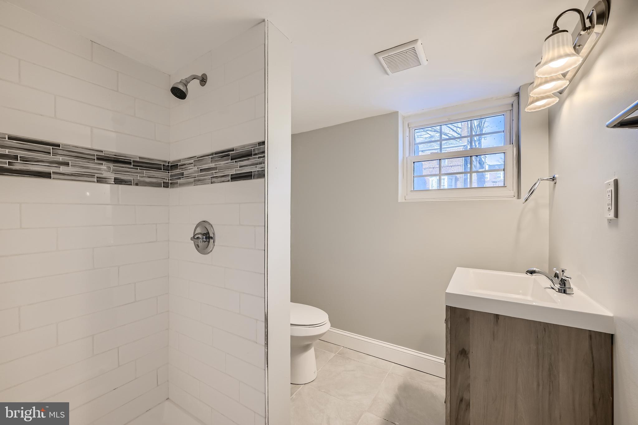1513 Shadyside Road Baltimore, MD 21218 - Photo 21 of 37 Updated Full Bathroom