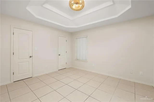 a bathroom with a toilet sink and shower