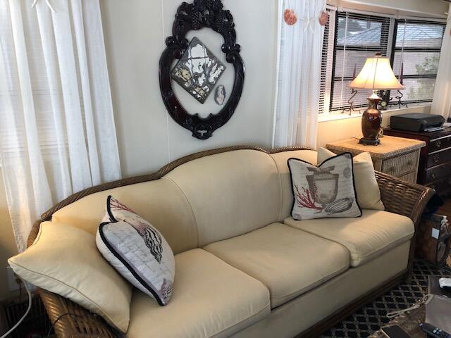 55 Boca Chica Road, Unit 32 Key West, FL 33040 - Photo 6 of 27 a living room with furniture and a window