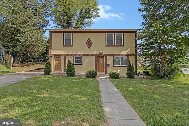 front view of house with a yard