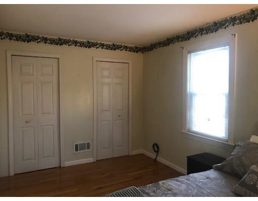 20 Hawthorne Road Holbrook, MA 02343 - Photo 12 of 22 a view of a livingroom with wooden floor and a window
