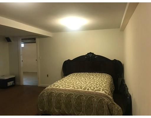 20 Hawthorne Road Holbrook, MA 02343 - Photo 15 of 22 a bedroom with a bed and a cabinets