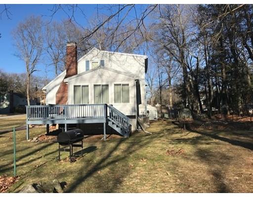 20 Hawthorne Road Holbrook, MA 02343 - Photo 19 of 22 a backyard of a house with table and chairs