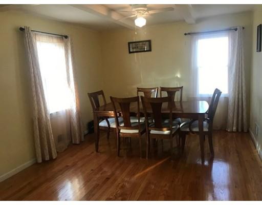 20 Hawthorne Road Holbrook, MA 02343 - Photo 4 of 22 a view of a dining room with furniture and wooden floor