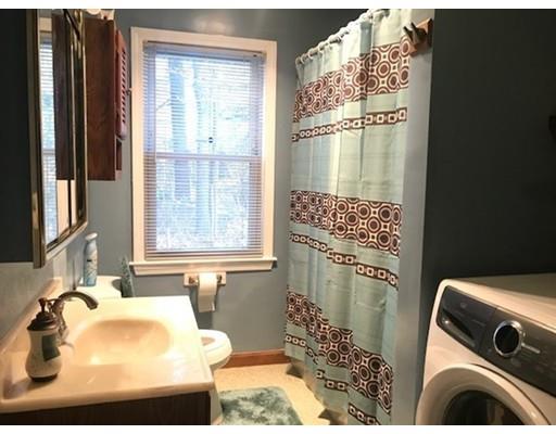 20 Hawthorne Road Holbrook, MA 02343 - Photo 6 of 22 a bathroom with a sink toilet and shower