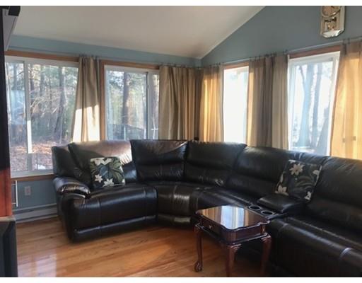 20 Hawthorne Road Holbrook, MA 02343 - Photo 8 of 22 a living room with furniture and a floor to ceiling window