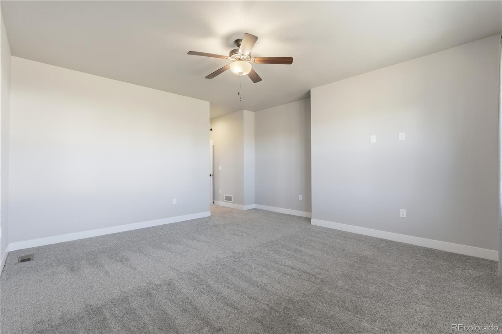 1908 Tidewater Lane Windsor, CO 80550 - Photo 12 of 41 a view of an empty room