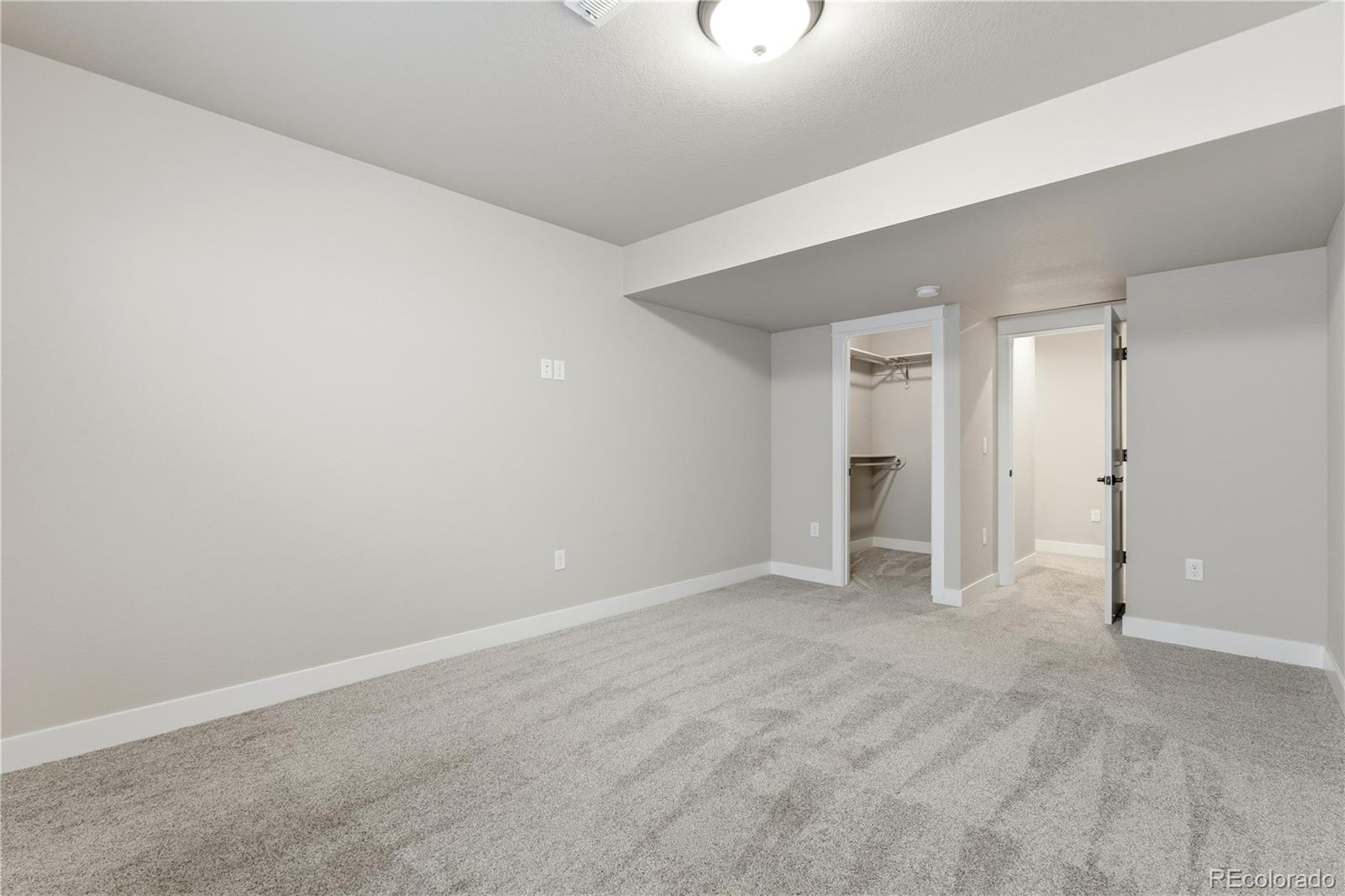 1908 Tidewater Lane Windsor, CO 80550 - Photo 31 of 41 a view of an empty room