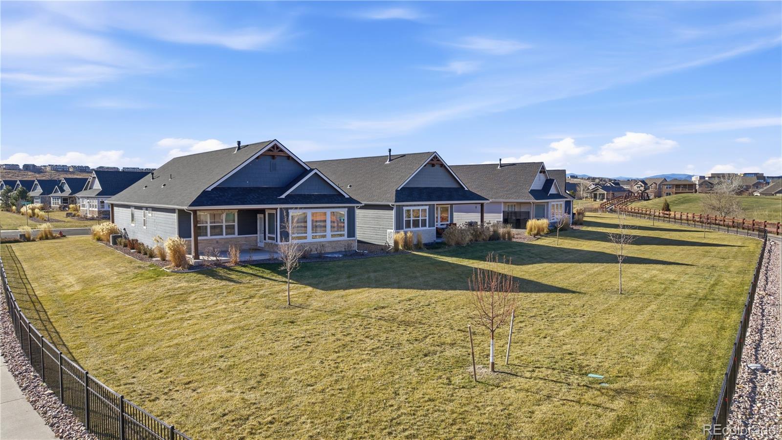 1908 Tidewater Lane Windsor, CO 80550 - Photo 34 of 41 a view of house with outdoor space and sitting area
