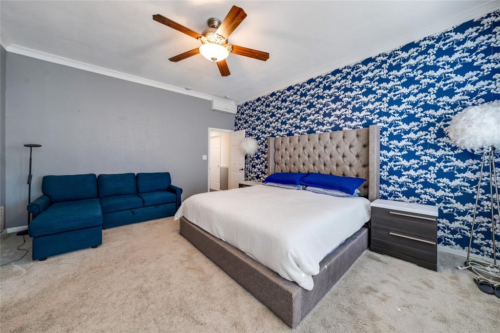 750 Long Road Lucas, TX 75002 - Photo 19 of 39 a bed room with a bed and a couch