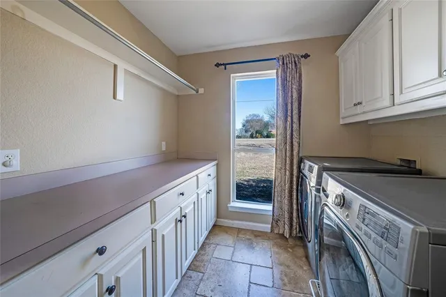 a kitchen with a stove and a refrigerator