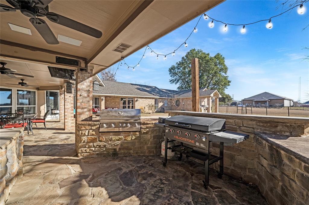 750 Long Road Lucas, TX 75002 - Photo 33 of 39 a view of a chairs and table in a patio