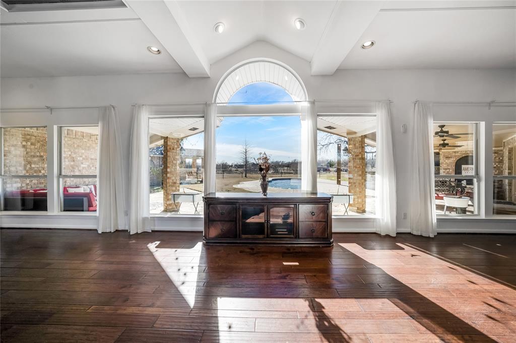 750 Long Road Lucas, TX 75002 - Photo 6 of 39 a living room with fireplace furniture and a large window
