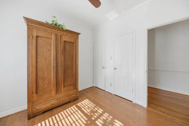 a view of an entryway with wooden floor
