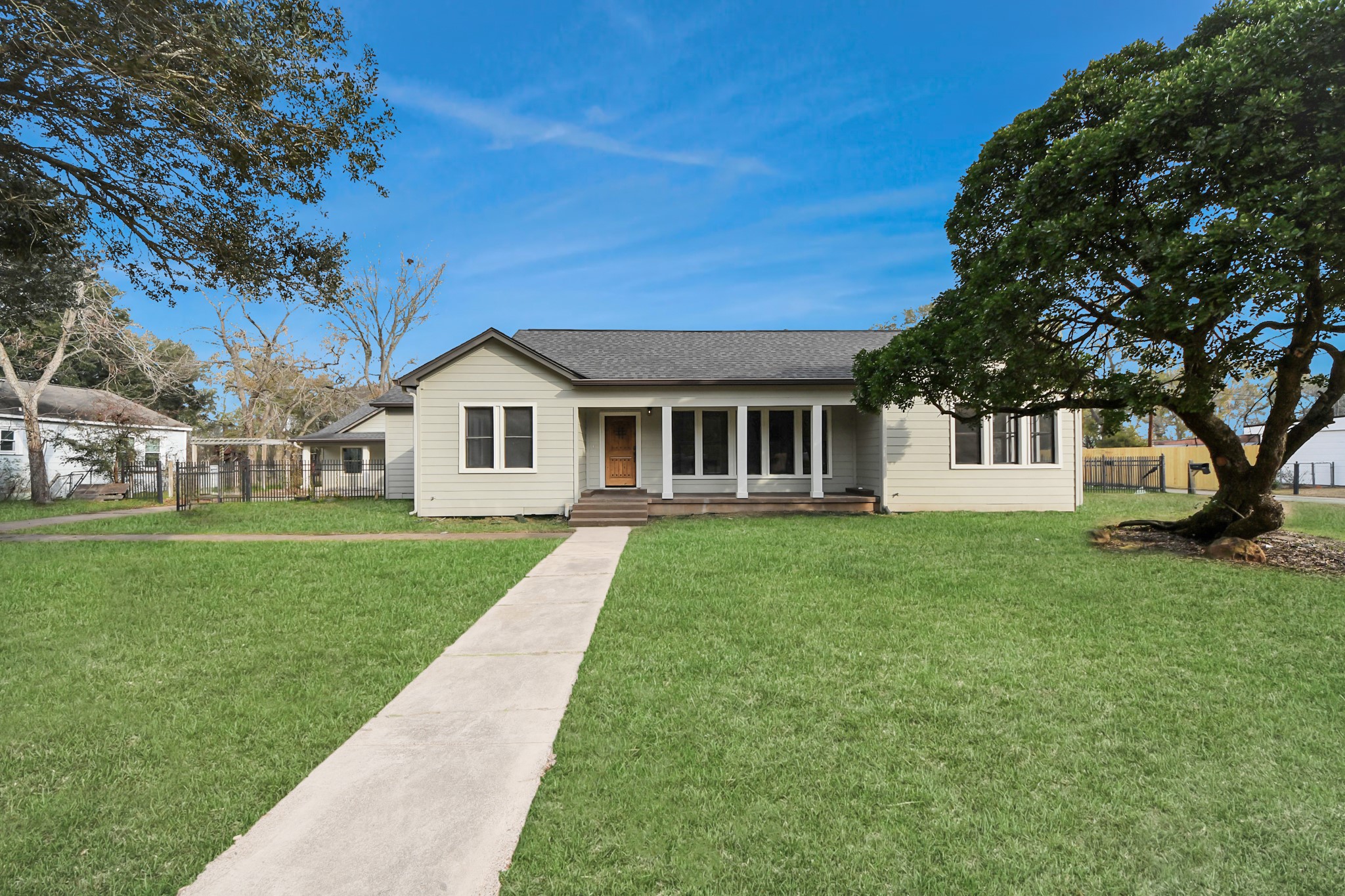 a view of a house with a big yard