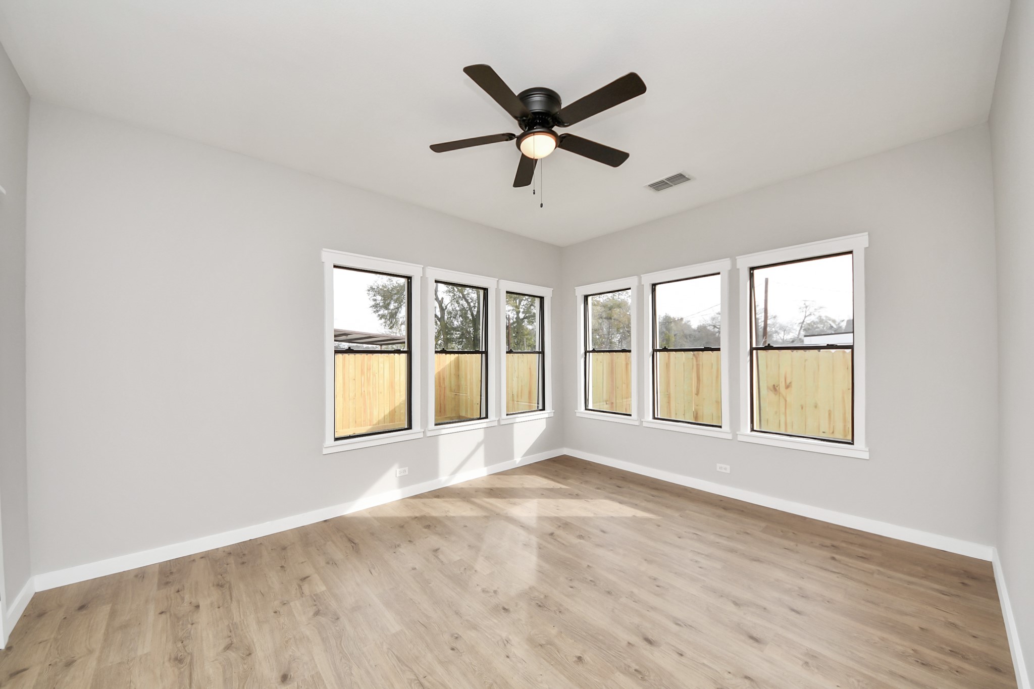 1507 Brooks Avenue Rosenberg, TX 77471 - Photo 16 of 35 a view of an empty room with a window