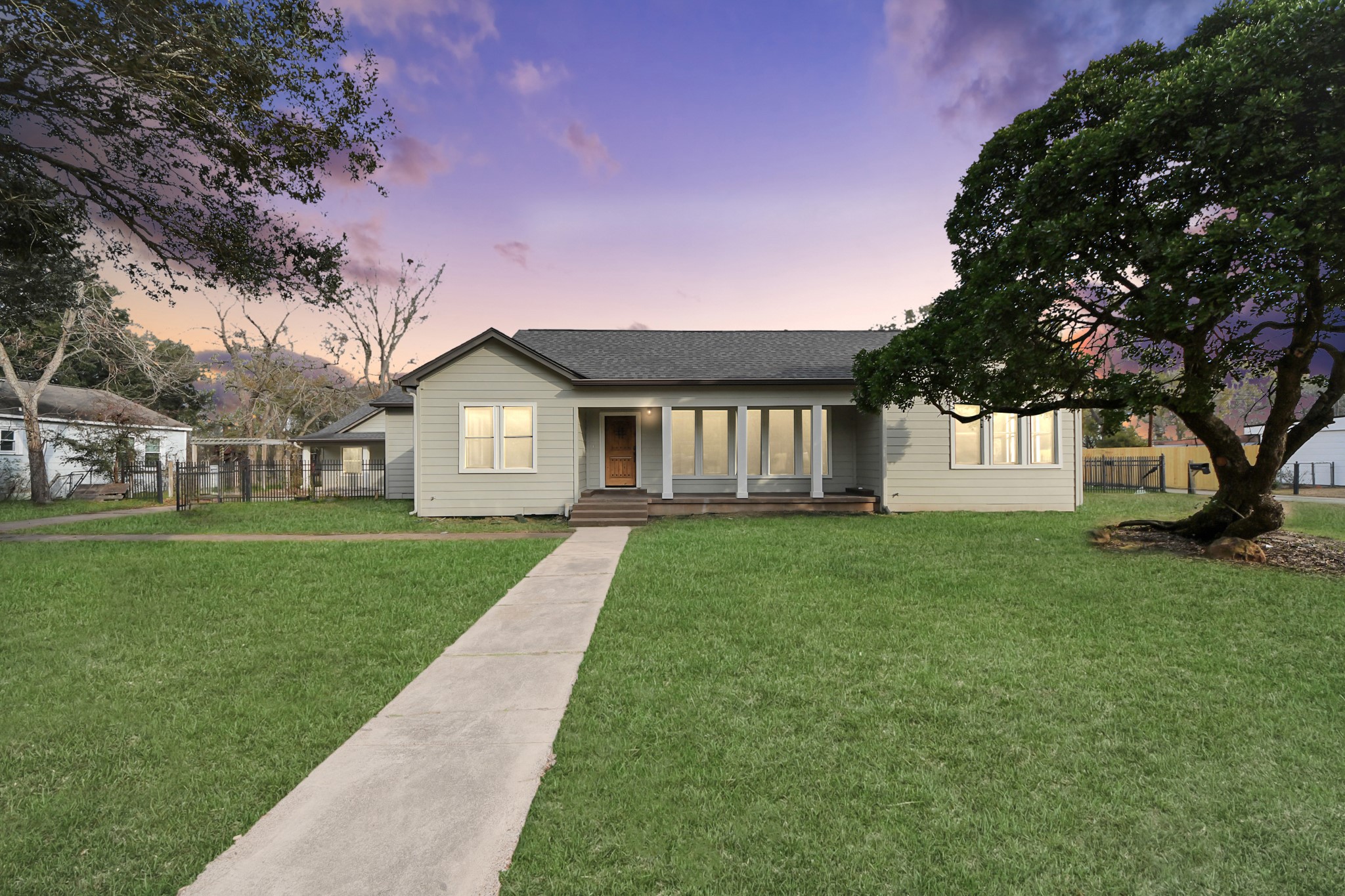1507 Brooks Avenue Rosenberg, TX 77471 - Photo 2 of 35 a front view of a house with a yard