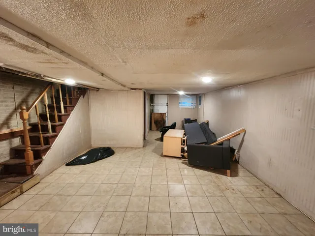 a view of storage and utility room with washer and dryer