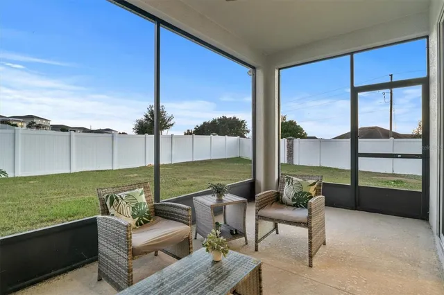 a outdoor living space with furniture and a garden