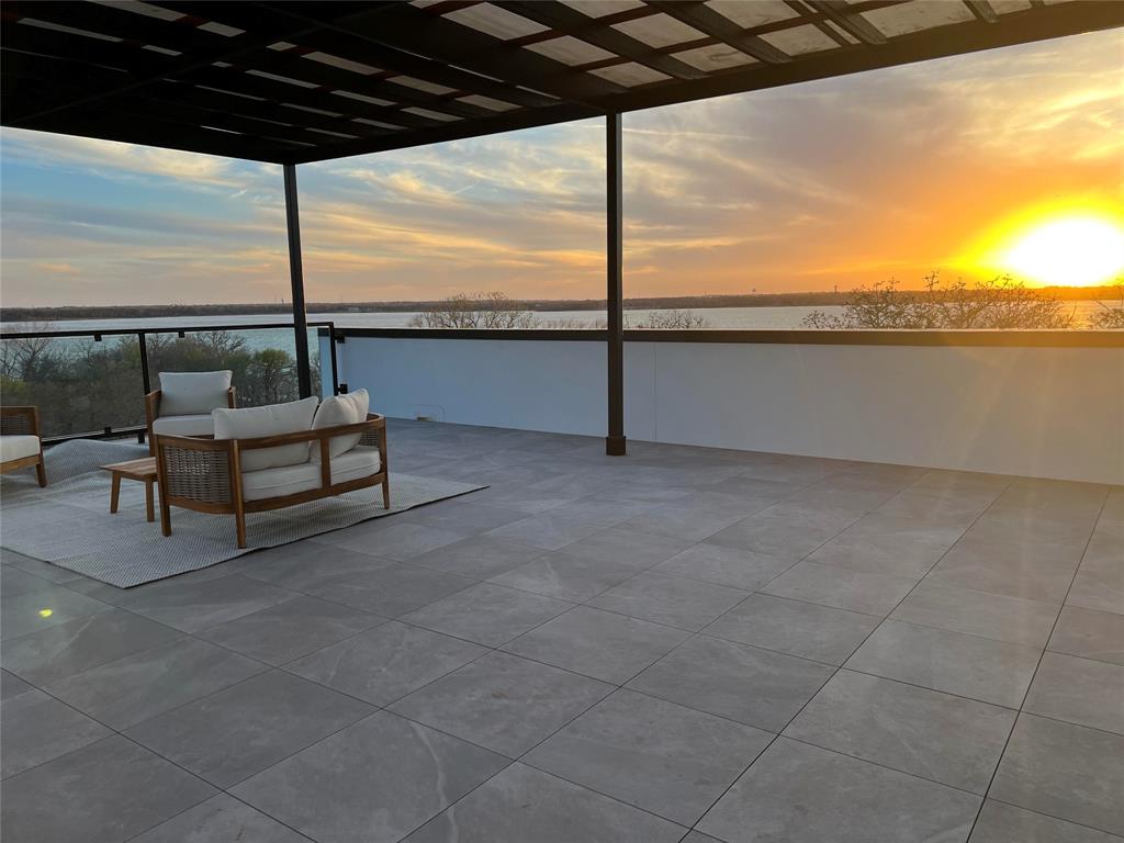 a view of a terrace with city view