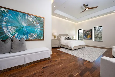 a living room with a bed and a couch