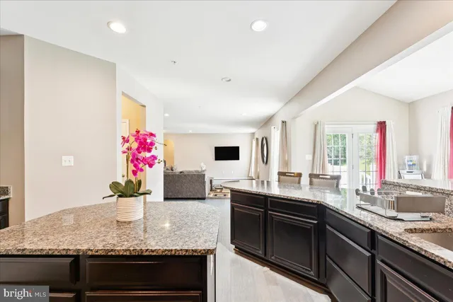 a kitchen with granite countertop lots of counter top space