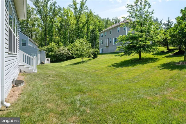a view of a back yard of the house