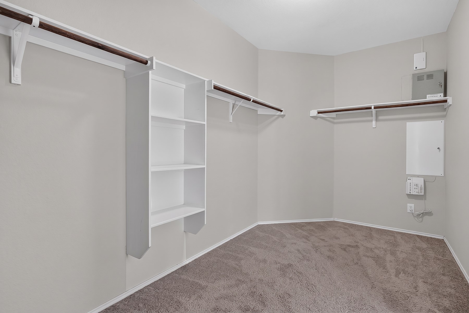 4601 Chestnut Meadows Bend Georgetown, TX 78626 - Photo 19 of 35 Ample shelving and hanging space in this well-appointed closet, providing practical storage solutions.