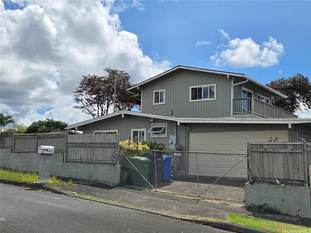a view of a house with a garage