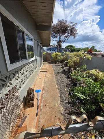 a backyard of a house with lots of green space