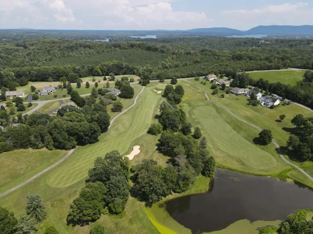 a view of a city with mountains