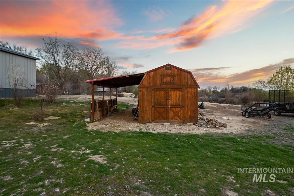 2417 Patch Ditch Road Homedale, ID 83628 - Photo 33 of 50 Outdoor structure at dusk with a shed