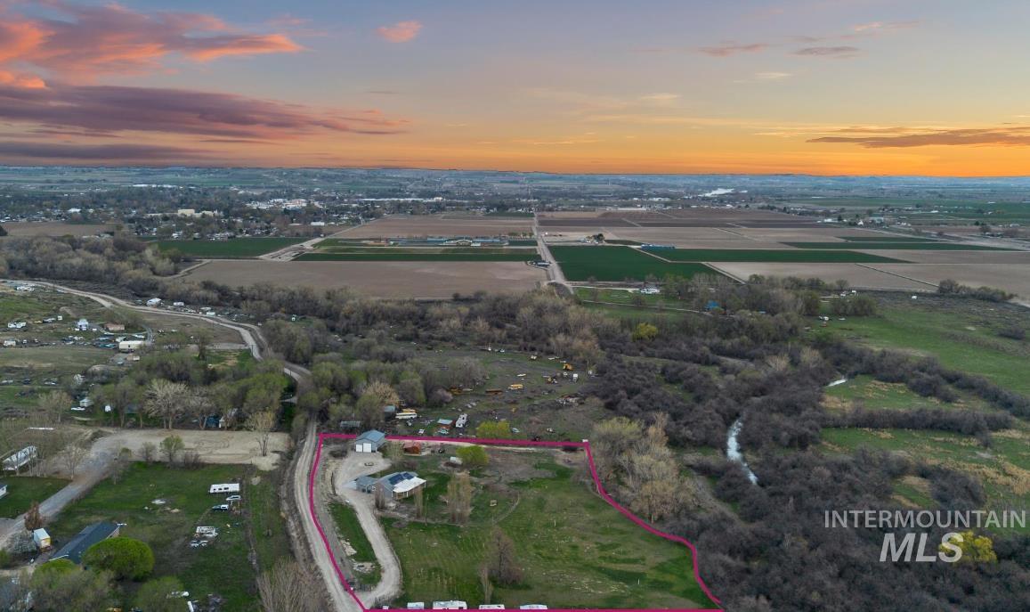 2417 Patch Ditch Road Homedale, ID 83628 - Photo 49 of 50 Aerial view at dusk of property parcel outlined and a view of rural / pastoral area