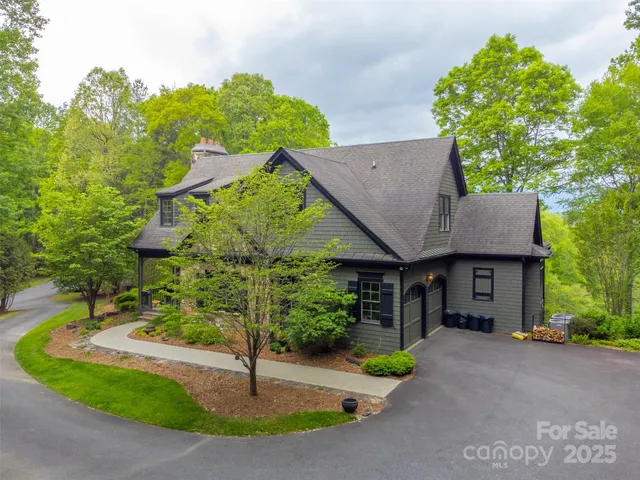 a view of a house with a street
