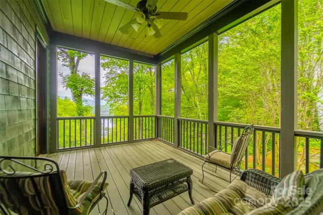 a view of balcony with furniture